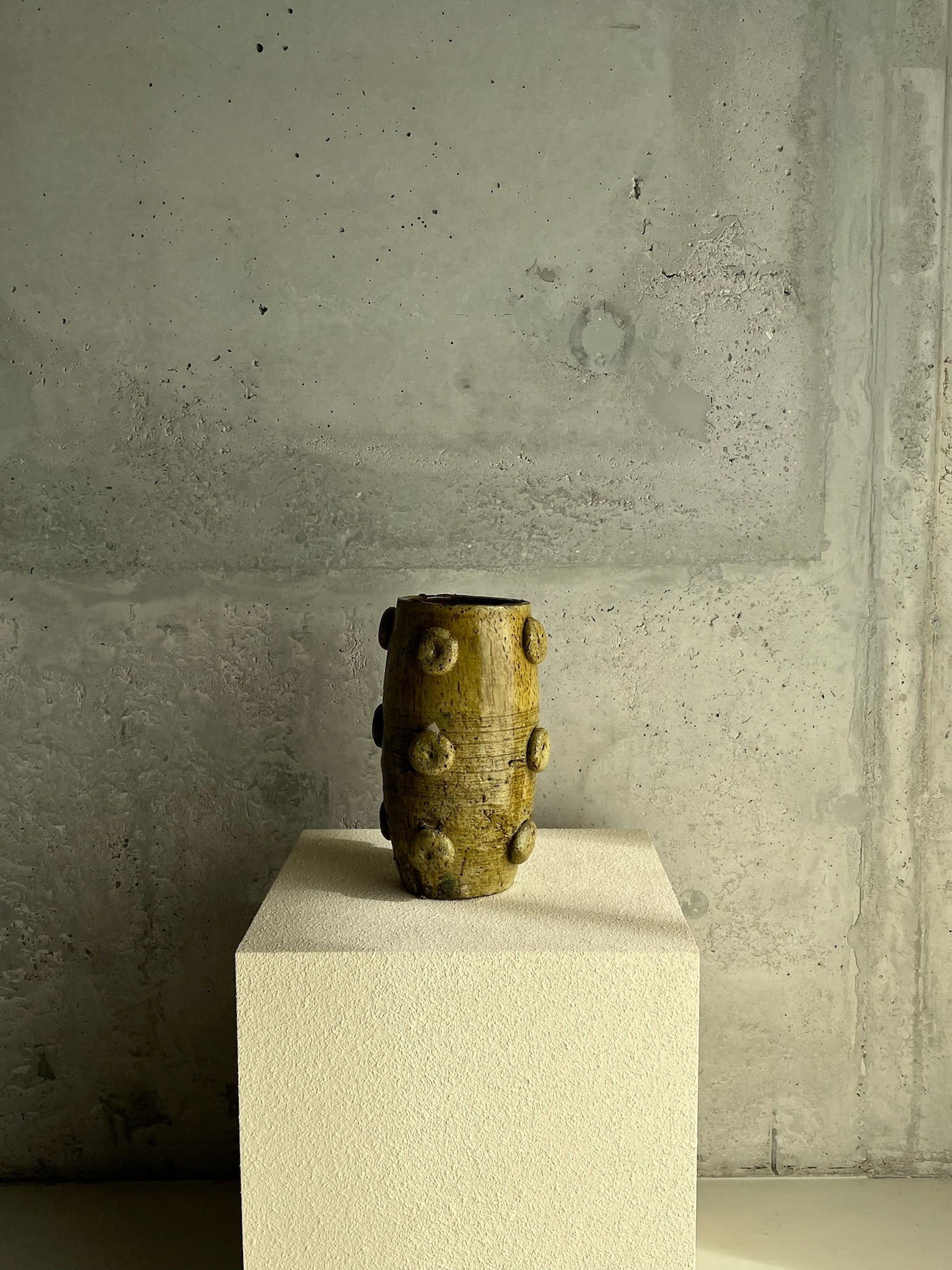 Ceramic vase with textured orbs